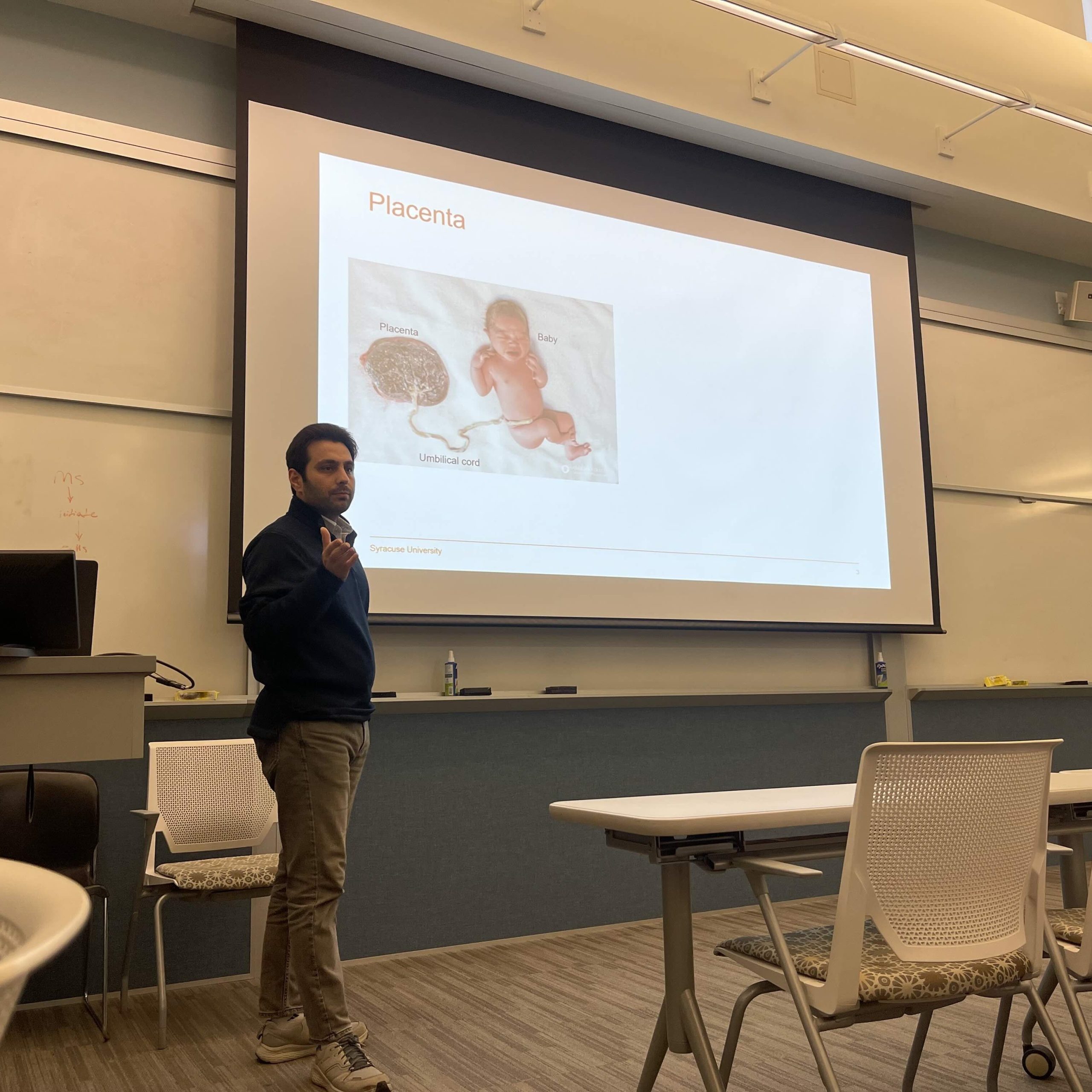 Student presenting research.