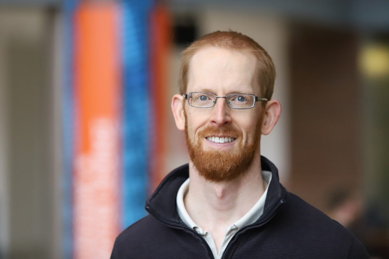 A headshot of James Henderson