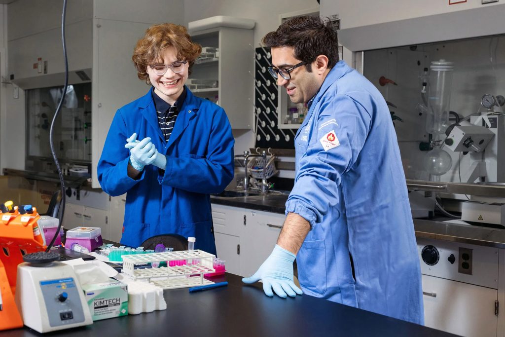 Professor Mozhdehi and Christopher Lynch in lab.